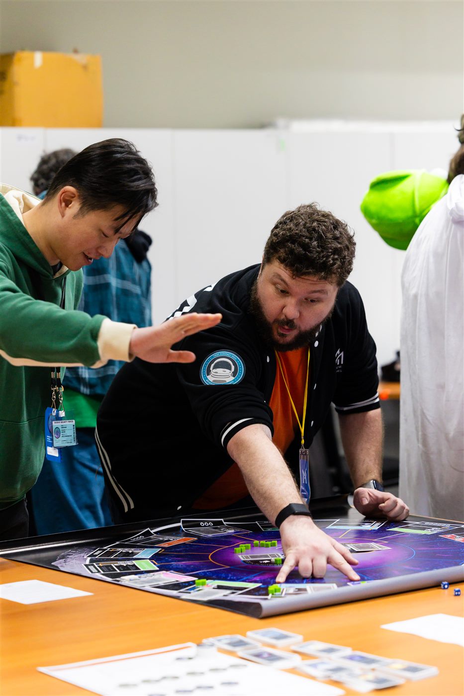 Tristan pointing at a game board during a live megagame session